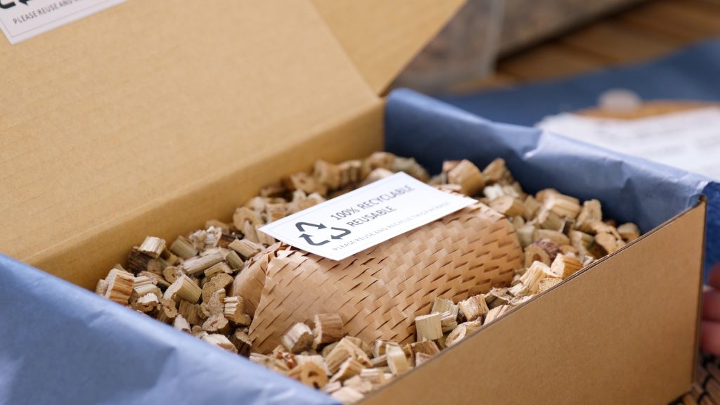 Net zero waste sustainable packaging with recycling symbol