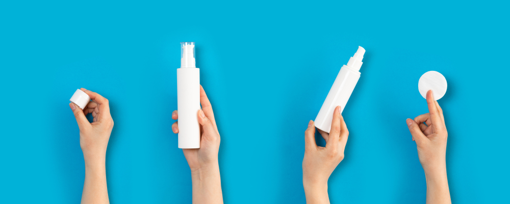 Hands holding health and beauty products